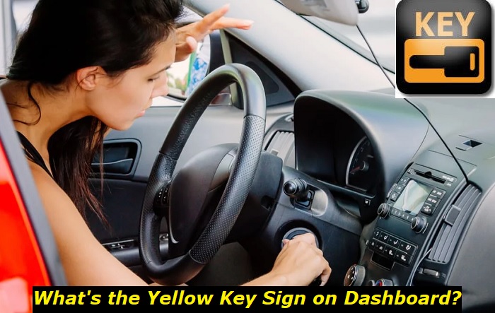 yellow key sign on dash